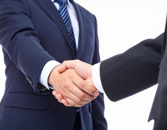 握手する男性社員